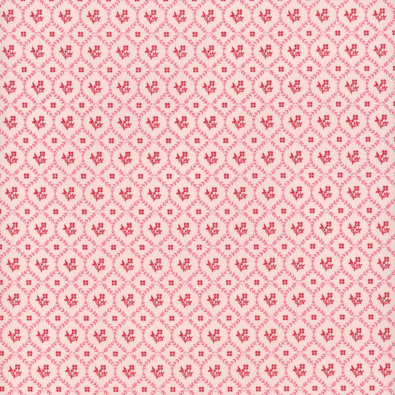 red lattice grid made of leaves with florals and square motifs inside each square on a pink fabric