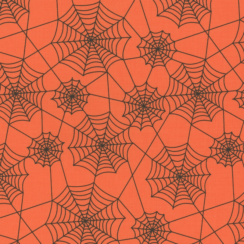 adorable orange fabric with black spiderwebs