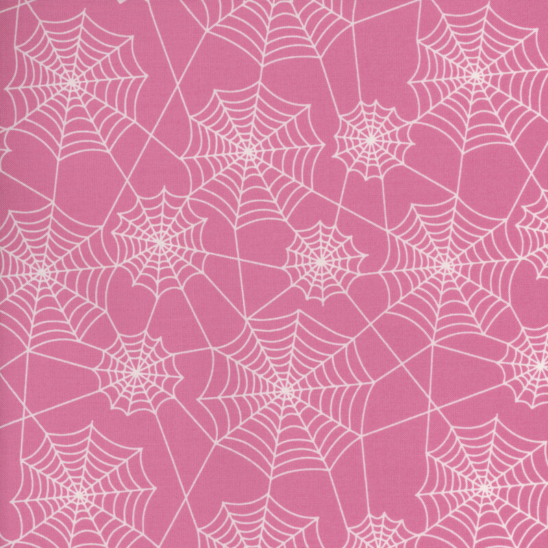 adorable pink fabric with white spiderwebs