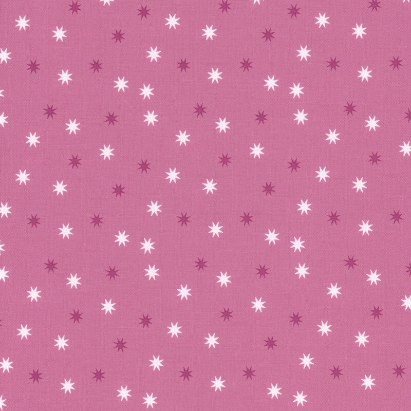 adorable pink fabric with scattered dark purple and white stars