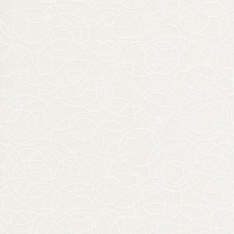 image of tonal fabric with geometric white circles on a white background 