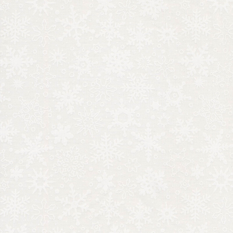 image of tonal fabric with white snowflakes on a white background 