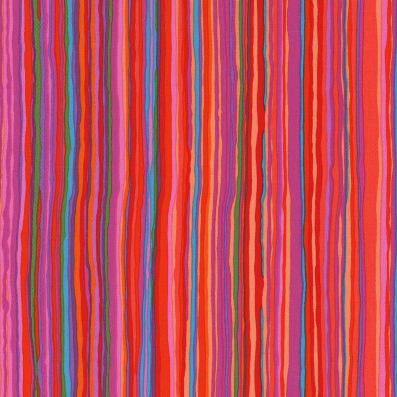 Fabric featuring vibrant peach, pink, red, orange, teal, and blue irregular stripes