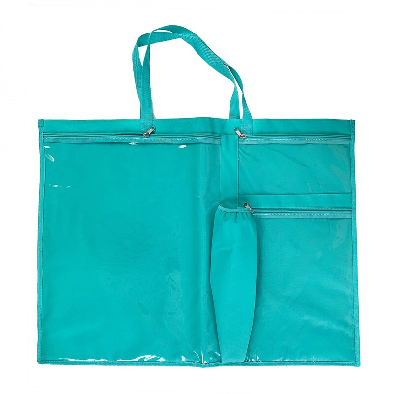 Image of the front of the teal tote, showing three vinyl pockets and one long cloth pocket