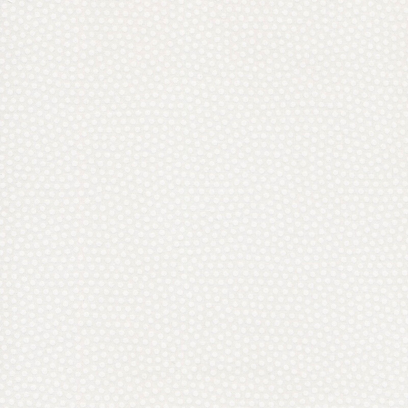 image of tonal fabric with white polka dots on a white background  