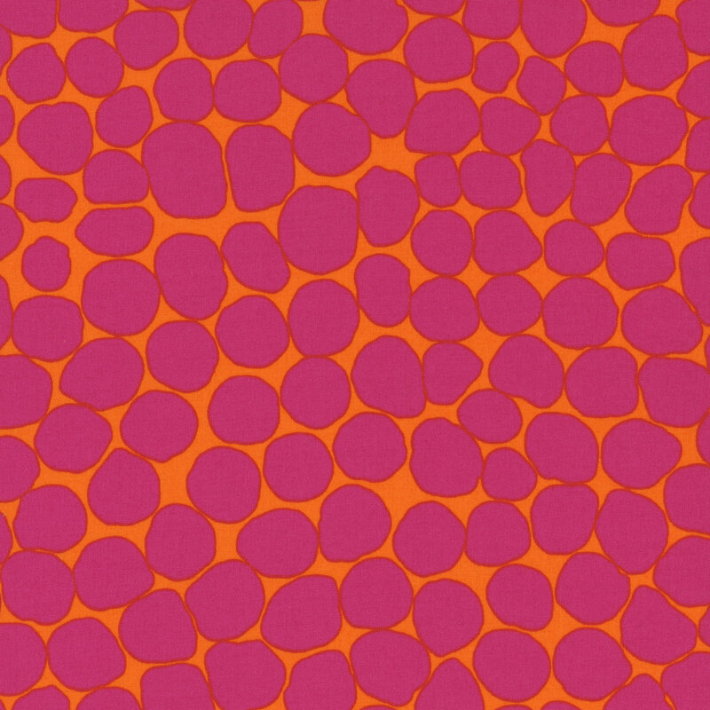 Fabric featuring vibrant magenta abstract dots over an orange background