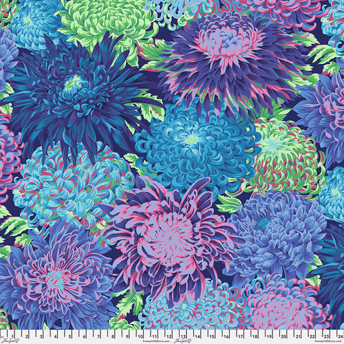 Fabric featuring vibrant green, blue, and purple chrysanthemums over a purple background