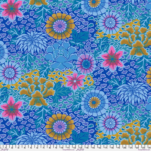 Fabric featuring vibrant blue, pink, and mustard yellow flowers over a blue and teal background with abstract blue and teal dots