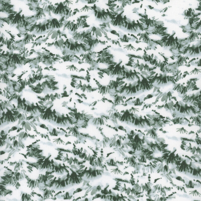 Fabric with a pattern of evergreen branches blanketed in white snow.