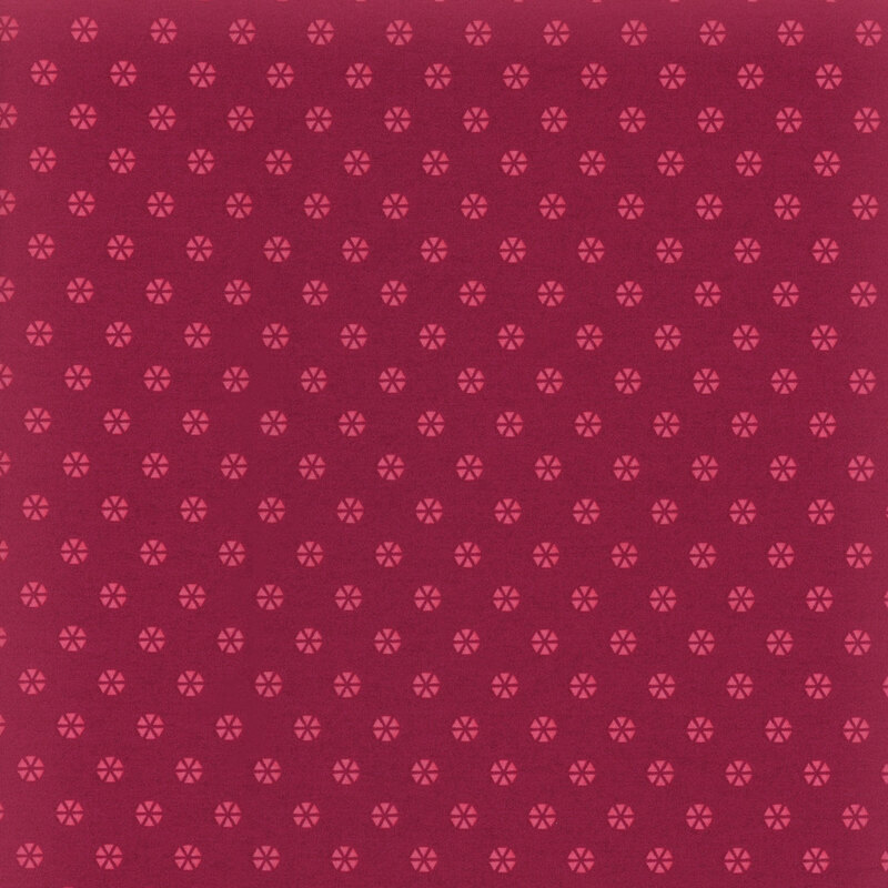 magenta fabric with pink hexagonal polka dots