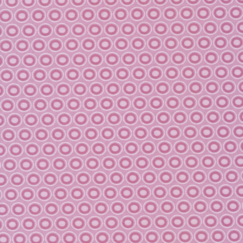 light purple fabric with a lovely purple and lilac oval polka dot design