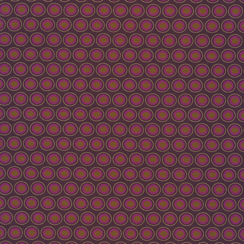 deep plum fabric with a lovely magenta and golden brown oval polka dot design