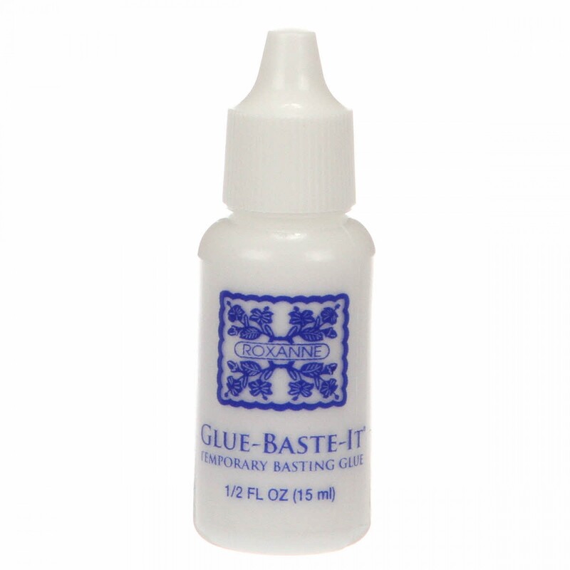A bottle of Roxanne Mini Glue Baste It, isolated on a white background