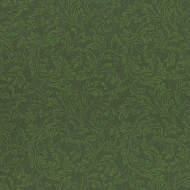 Green fabric with tonal scrolls in swirling leaf patterns.