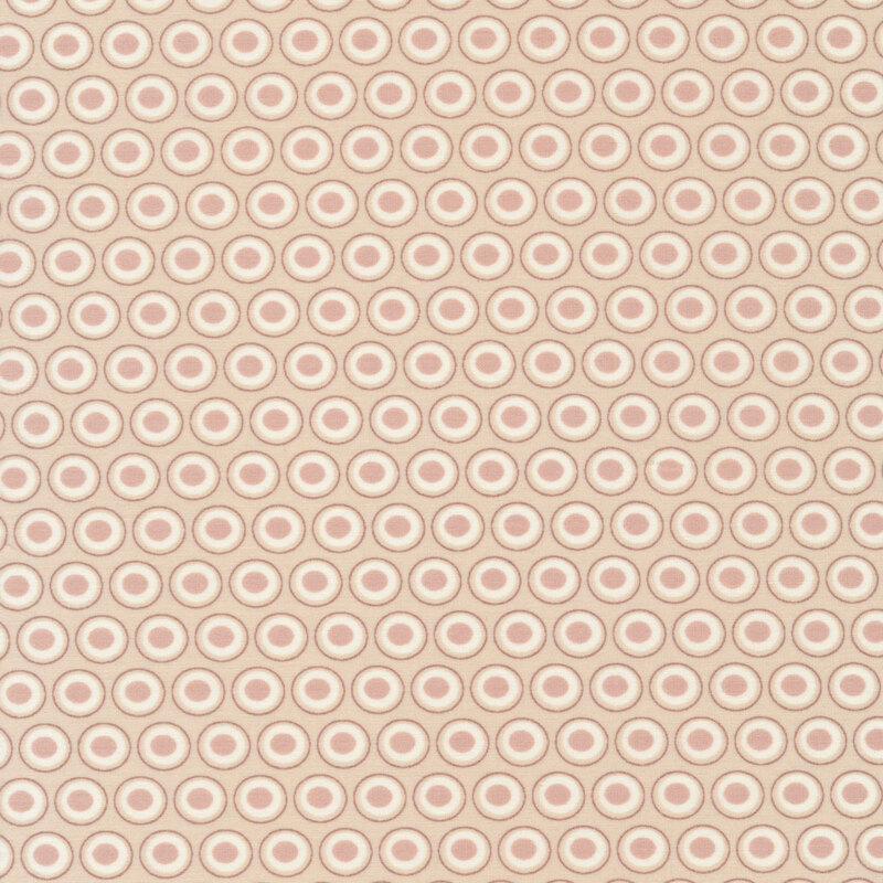 cream fabric with a white and light brown oval polka dot design