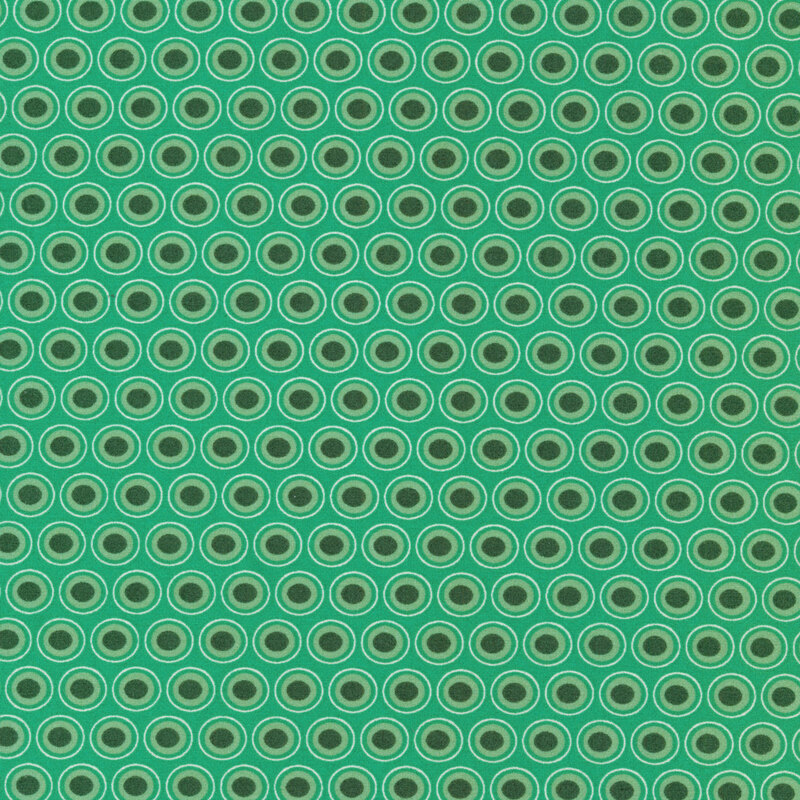 teal fabric with a lovely pale green and dark green oval polka dot design