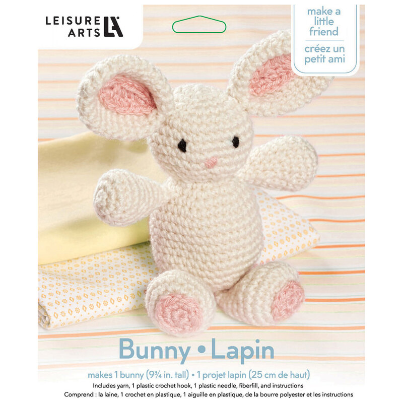 Front of the kit, showing the complete crocheted bunny staged in front of coordinating, folded up fabric