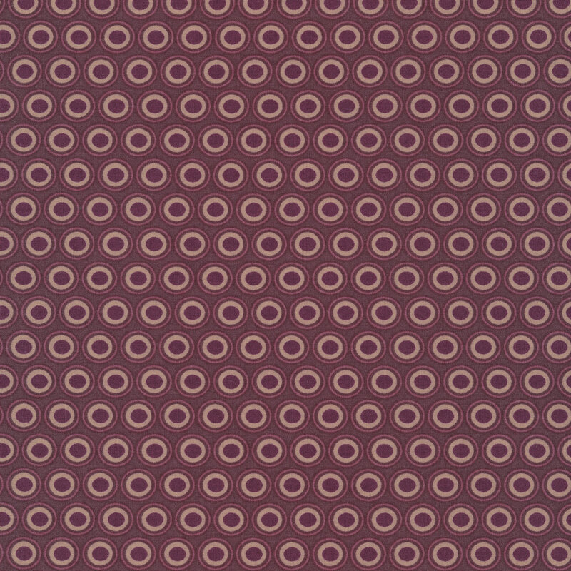 prune brown fabric with a lovely gray and dark purple oval polka dot design