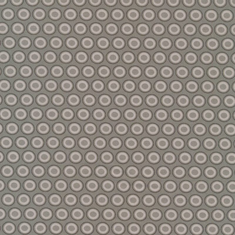 Dark gray fabric with a lovely silver and gray oval polka dot design