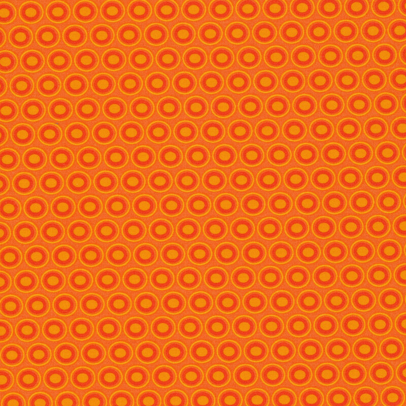bright orange fabric with a lovely blood orange and apricot oval polka dot design