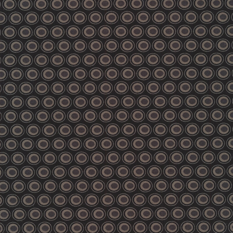 Black fabric with a lovely light gray and dark gray oval polka dot design