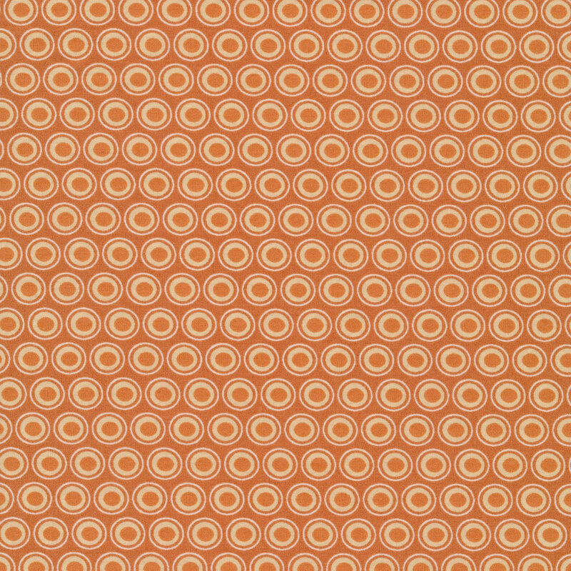 Dark tan fabric with a lovely cream and light brown oval polka dot design