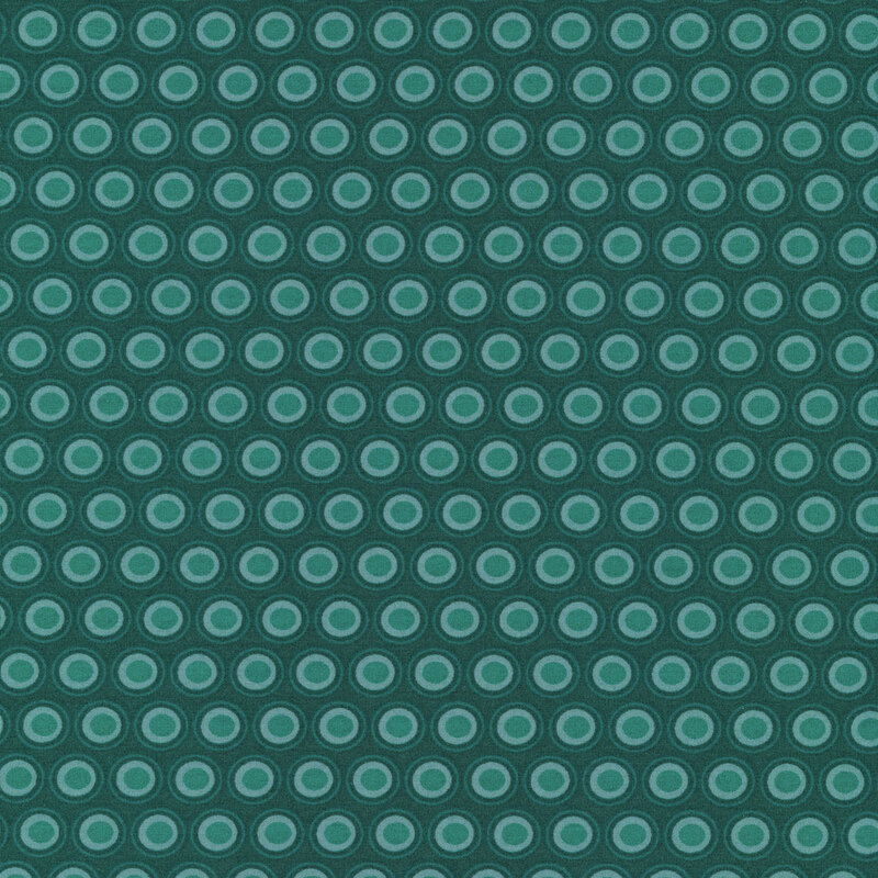 Dark teal fabric with a lovely aqua and teal oval polka dot design