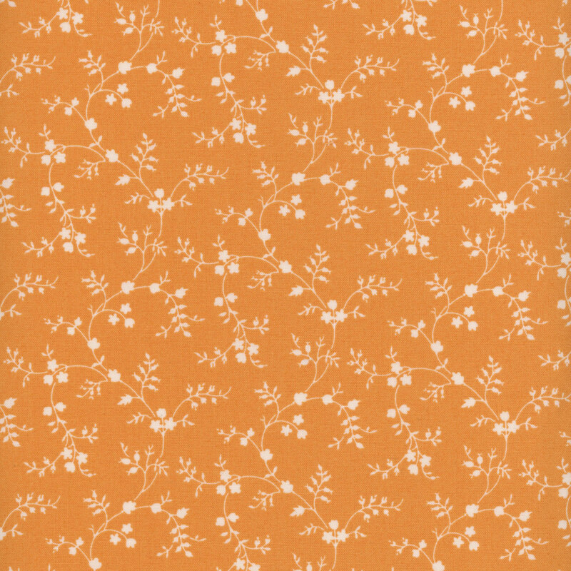 Pumpkin fabric with cream vines with tiny flowers and leaves all over