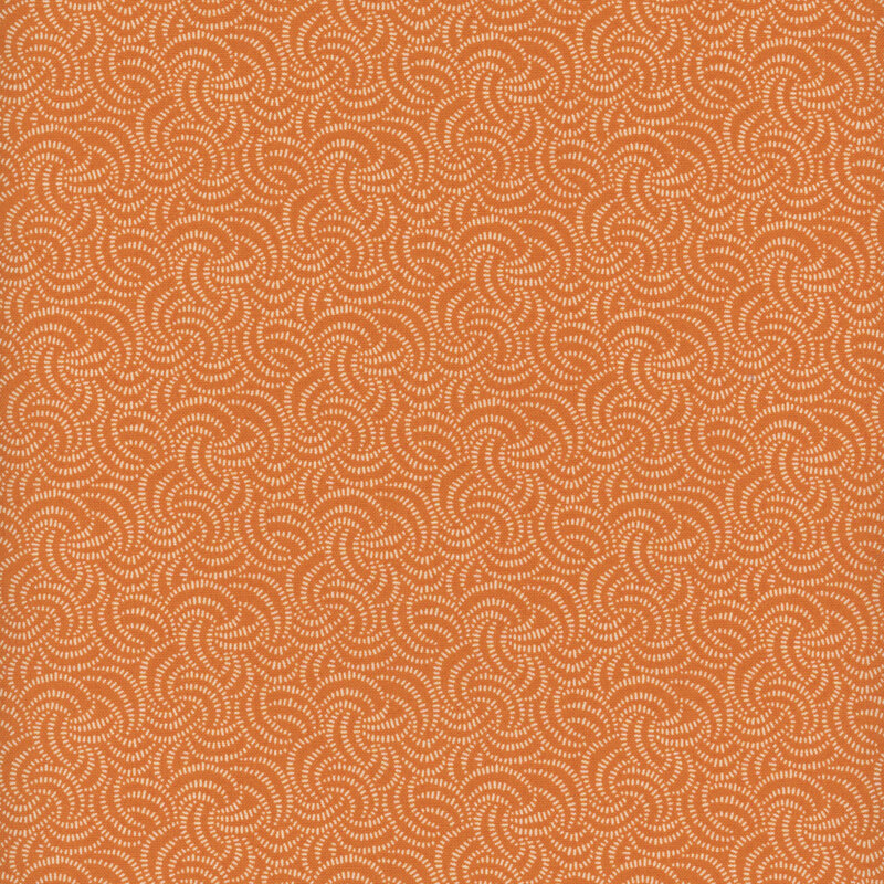 Orange fabric with intertwined, curved motifs in cream all over