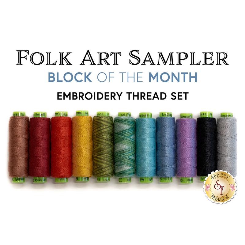 Row of thread spools in a rainbow of colors isolated on a white background with the words, 