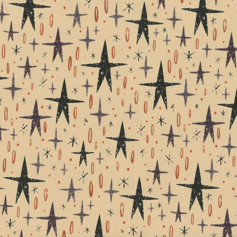 lovely cream fabric, featuring stylized black and gray stars, alongside various gray, black, and orange star motifs