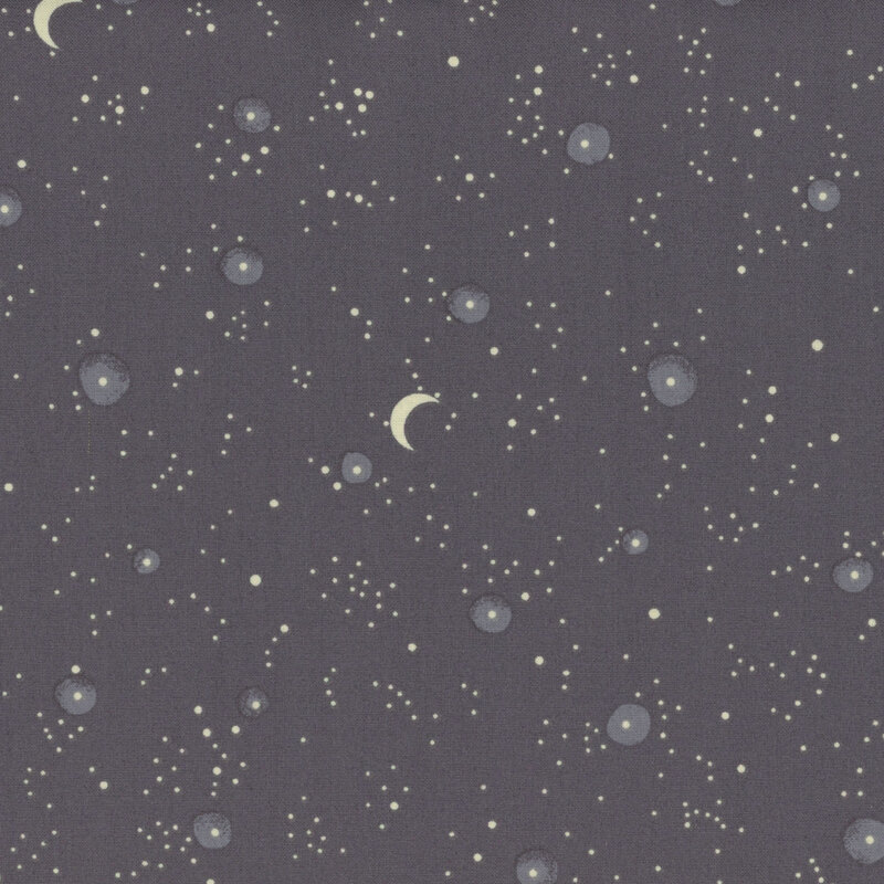 soft gray fabric, featuring scattered cream stars, with an occasional crescent moon