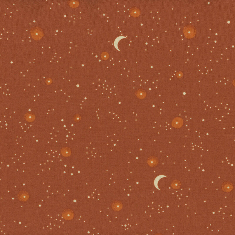 Burnt orange fabric, featuring scattered cream stars that glow orange, with an occasional crescent moon