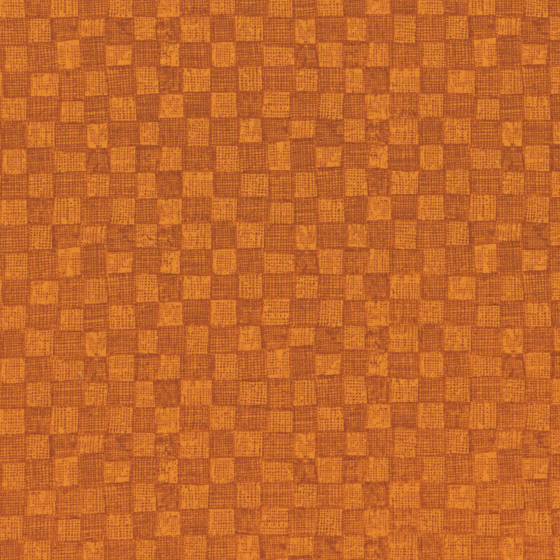 tonal orange checkerboard fabric with a cross hatch texture