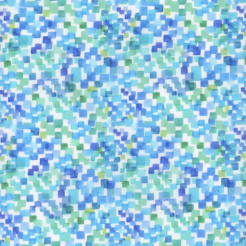 Small bright blue and green squares on white fabric.