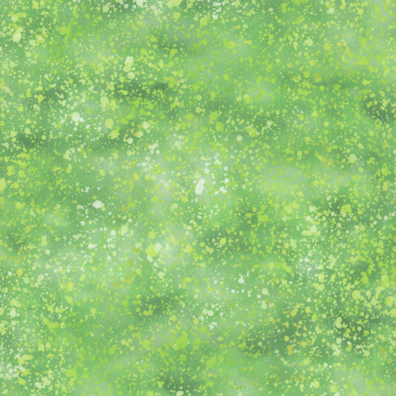 Green mottled fabric with a watercolor splatter effect.
