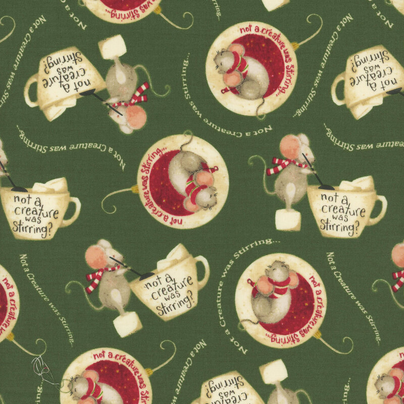 forest green fabric adorned with sleeping mice in ornaments and mice stirring mugs of hot cocoa