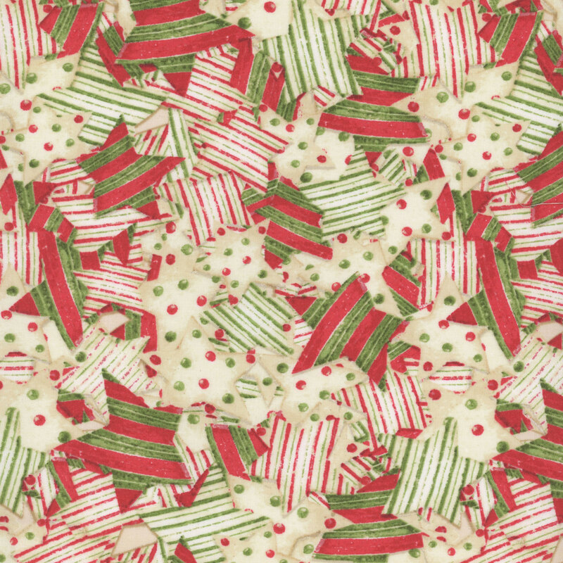packed sugar cookie fabric, with each star shaped cookies decorated with green and red stripes and dots