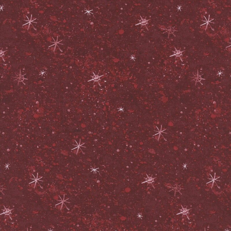 snowflake covered dark red fabric