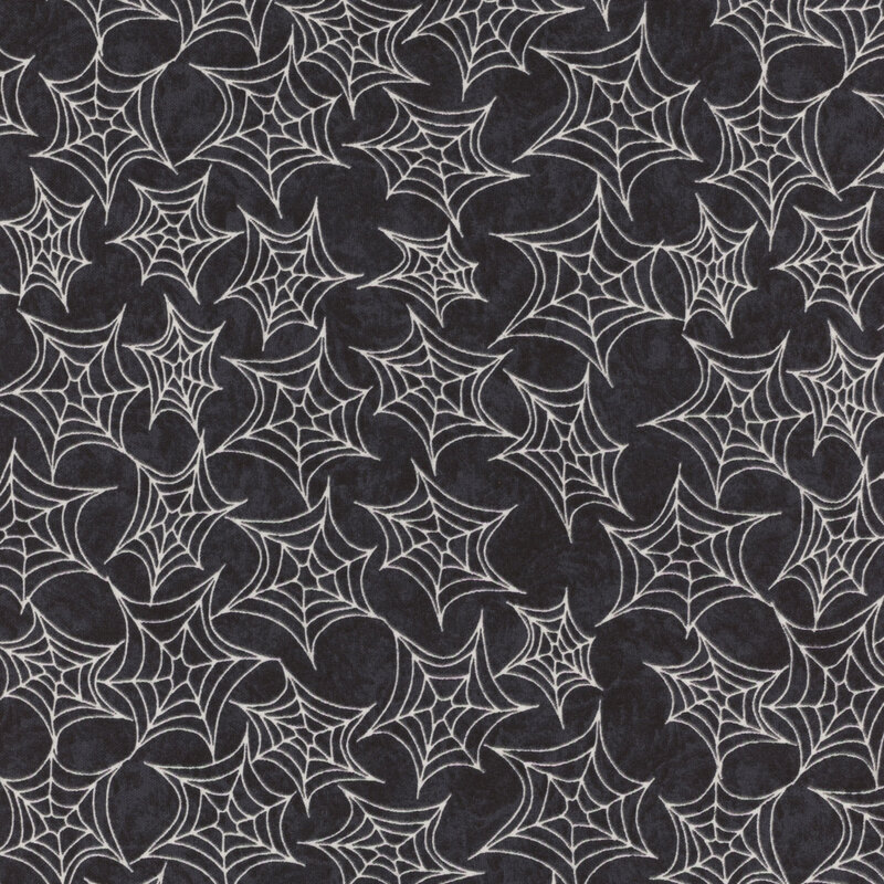 delightful black mottled fabric with white spiderwebs scattered across it