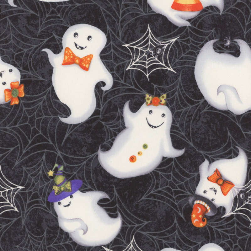 delightful black mottled fabric with scattered spiderwebs and a variety of different ghosts