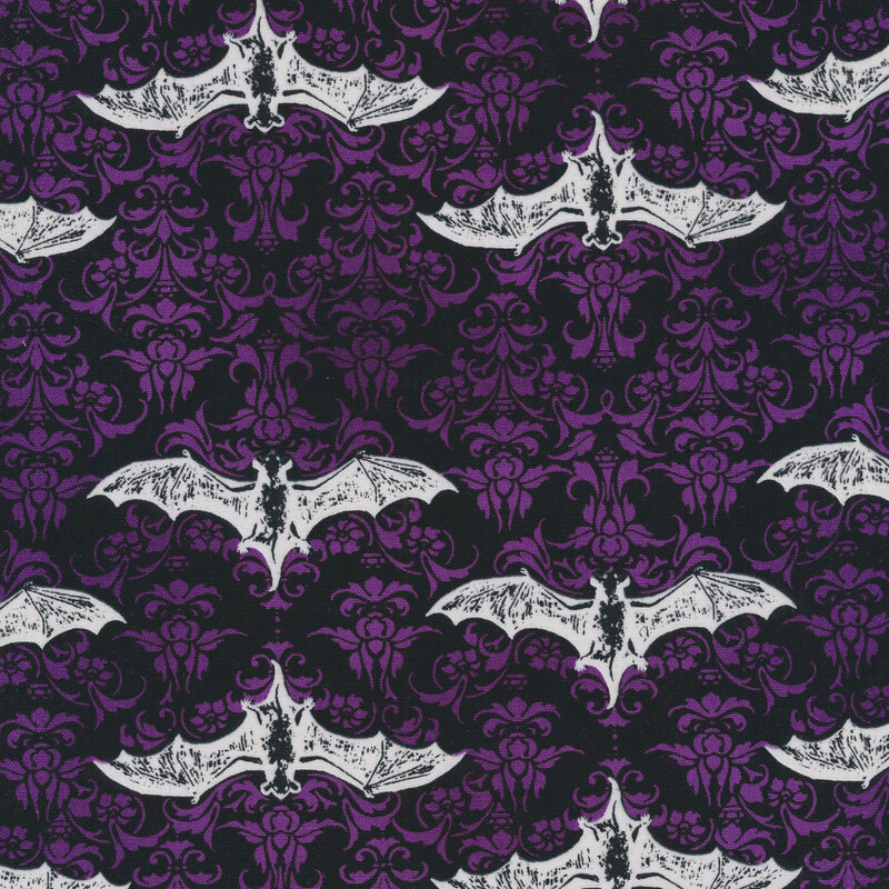 fabric featuring white bats and purple damask designs on a black background