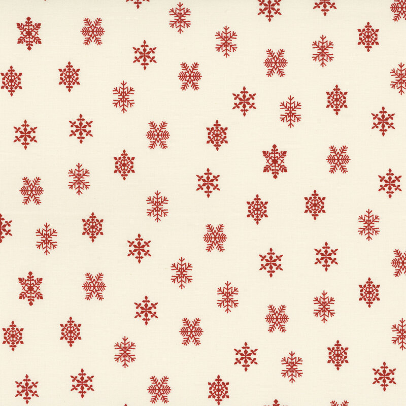 lovely cream fabric featuring scattered red snowflakes