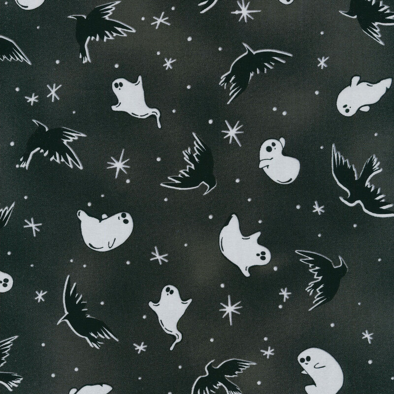 fabric featuring tossed ghosts, crows, stars and dots on a black background