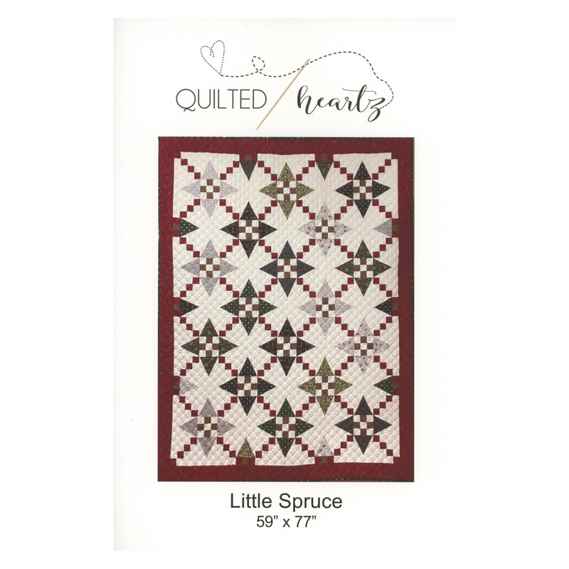 Front of pattern showing the finished quilt in cool toned neutrals, navy, green, and burgundy