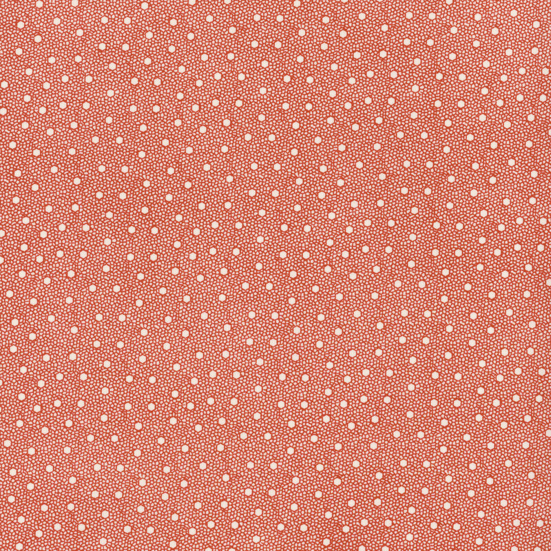 lovely red textured fabric featuring scattered geometric white dots