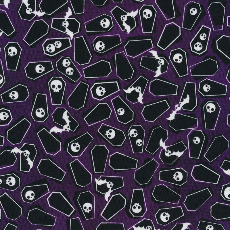 fabric featuring scattered coffins, bats and skulls on a purple background