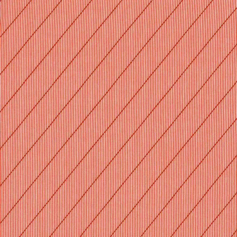 lovely red and white striped fabric featuring a darker red diagonal stripe