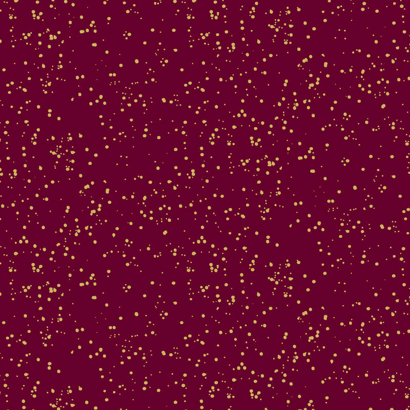 dark red fabric with metallic gold speckling