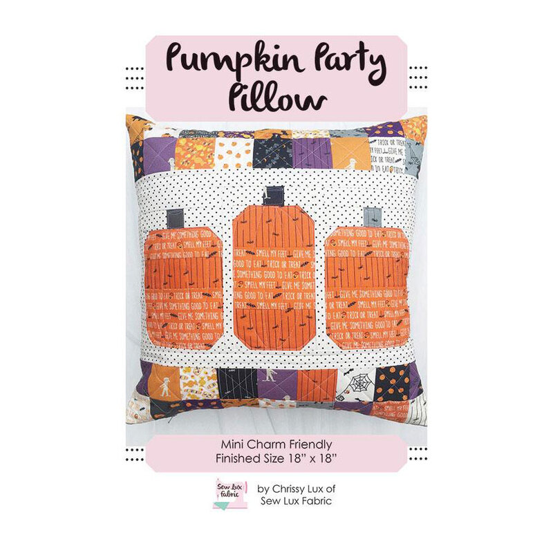 Front cover of pattern showing the finished pillow project isolated on a white background
